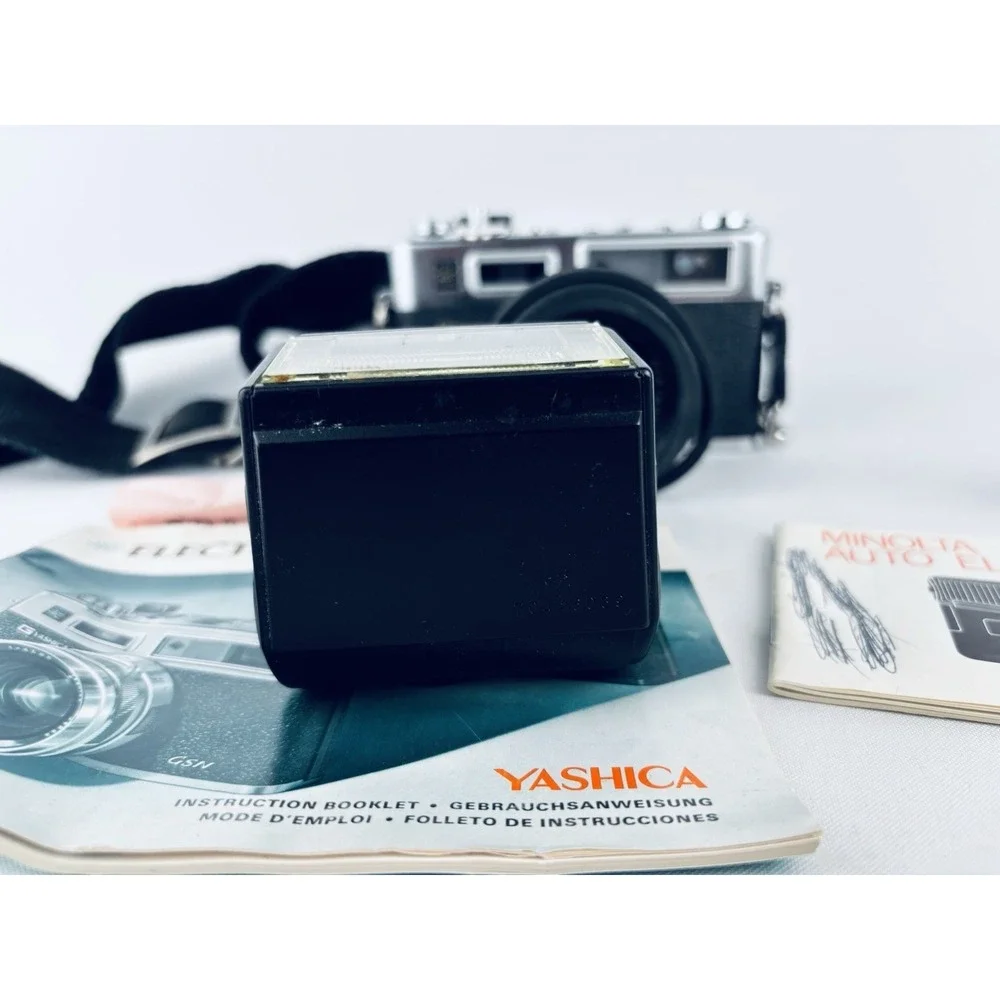 Yashica Vintage Electro 35 GSN Camera & Minolta Electroflash 28 & Film & Books